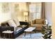 Living room with neutral colors, a comfortable sofa, chair and lots of natural light at 9451 E Becker Ln # 1051, Scottsdale, AZ 85260