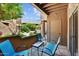 Private patio features comfortable seating, views of the community, and a well-maintained landscape at 9451 E Becker Ln # 1051, Scottsdale, AZ 85260