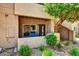 Cozy patio with small garden, shaded by mature trees, offering a relaxing outdoor space at 9451 E Becker Ln # 1051, Scottsdale, AZ 85260