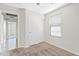 Cozy bedroom featuring a window, carpet flooring, closet with standard doors and neutral paint at 973 E Kelsi Ave, San Tan Valley, AZ 85140