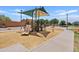 Community playground with slides, climbing structures, and shaded areas for Gathering fun and recreation at 973 E Kelsi Ave, San Tan Valley, AZ 85140