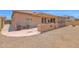 Spacious backyard with a built-in outdoor kitchen, gravel groundcover, and patio at 10536 W Villa Hermosa --, Peoria, AZ 85383