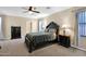 Well-lit main bedroom featuring neutral tones and plush carpeting at 10536 W Villa Hermosa --, Peoria, AZ 85383