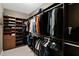 Walk-in closet with custom shelving and racks for organized clothing and shoe storage at 10536 W Villa Hermosa --, Peoria, AZ 85383