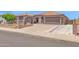 Spacious single-story home with desert landscaping and a wide driveway at 10536 W Villa Hermosa --, Peoria, AZ 85383