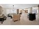 Open-concept living room with tile flooring and recessed lighting at 10536 W Villa Hermosa --, Peoria, AZ 85383