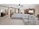 Open concept living room featuring a white leather reclining sectional sofa and tile floors at 10536 W Villa Hermosa --, Peoria, AZ 85383