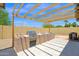 Outdoor kitchen with a built-in grill, counter space, and a pergola above at 10536 W Villa Hermosa --, Peoria, AZ 85383