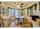 Cozy dining room with bright windows and classic furnishings at 11022 N 60Th Dr, Glendale, AZ 85304