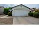 Exterior shot of garage and partial view of the house at 11022 N 60Th Dr, Glendale, AZ 85304
