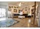 Cozy living room with neutral furniture, tile floors, and a ceiling fan at 11022 N 60Th Dr, Glendale, AZ 85304