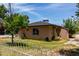 Single-story home with desert landscaping visible from across the street, under a sunny sky at 1134 W 2Nd St, Mesa, AZ 85201