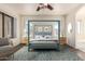 Bedroom with hardwood floors and large canopy bed at 13241 W Desert Ln, Surprise, AZ 85374