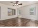 Bright bedroom featuring wood-look flooring, a ceiling fan, recessed lighting, and natural light at 13241 W Desert Ln, Surprise, AZ 85374