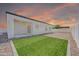 Large backyard featuring a covered patio and low-maintenance landscaping at 14178 S Diablo Rd, Arizona City, AZ 85123