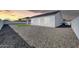Expansive backyard featuring gravel and a cozy covered patio area for outdoor enjoyment at 14178 S Diablo Rd, Arizona City, AZ 85123