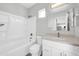 Clean bathroom features a shower-tub combo, a vanity with a white cabinet, and neutral countertops at 14178 S Diablo Rd, Arizona City, AZ 85123