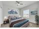 Comfortable bedroom with plush carpet, neutral tones, and well-lit ambiance at 14178 S Diablo Rd, Arizona City, AZ 85123