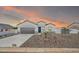 Charming single-story home with stucco and desert landscaping and spacious driveway at 14178 S Diablo Rd, Arizona City, AZ 85123