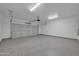 Spacious garage with epoxy flooring and ample room for parking and storage at 14178 S Diablo Rd, Arizona City, AZ 85123
