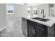 Stylish kitchen island featuring sleek fixtures and an undermount sink in an open floor plan at 14178 S Diablo Rd, Arizona City, AZ 85123