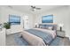 Serene main bedroom with calming decor, large bed, and walk-in closet at 14178 S Diablo Rd, Arizona City, AZ 85123