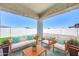 Inviting outdoor patio with comfortable seating and views of the expansive yard at 14178 S Diablo Rd, Arizona City, AZ 85123