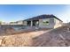 Modern backyard with an in-progress pool and fresh construction, ready for personalized landscaping at 14687 N 73Rd Dr, Peoria, AZ 85381