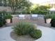 Outdoor BBQ area with built-in grills and lush greenery provides an ideal space for alfresco dining and entertainment at 15221 N Clubgate Dr # 2059, Scottsdale, AZ 85254