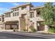 Modern condo building with neat landscaping and stucco facade, showing curb appeal in a desirable neighborhood at 15221 N Clubgate Dr # 2059, Scottsdale, AZ 85254