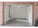 Clean, spacious garage interior offering ample room for parking and storage, enhancing home functionality at 15221 N Clubgate Dr # 2059, Scottsdale, AZ 85254