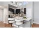 Modern kitchen with a large island, stainless steel appliances, and stylish backsplash at 15221 N Clubgate Dr # 2059, Scottsdale, AZ 85254