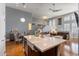 Open-concept kitchen with a large island, modern appliances, and hardwood floors at 15221 N Clubgate Dr # 2059, Scottsdale, AZ 85254