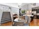 Open-concept living space with kitchen, dining area, fireplace, and staircase at 15221 N Clubgate Dr # 2059, Scottsdale, AZ 85254