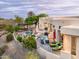 An expansive backyard featuring a curved patio, a swimming pool, spa and ample seating areas perfect for entertaining at 15816 E Eagle Crest Rd, Fountain Hills, AZ 85268