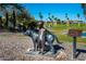 Bronze sculpture of a boy and dog at Fountain Park in Fountain Hills, Arizona, near local real estate at 15816 E Eagle Crest Rd, Fountain Hills, AZ 85268