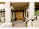 Front door area of a home featuring a brick walkway and stone columns, and desert flora at 15816 E Eagle Crest Rd, Fountain Hills, AZ 85268