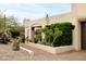Exterior of a home with manicured desert landscaping, with trees and bushes at 15816 E Eagle Crest Rd, Fountain Hills, AZ 85268