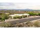 An exterior front elevation shows beautiful desert landscaping and a circular driveway at 15816 E Eagle Crest Rd, Fountain Hills, AZ 85268