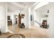 Bright foyer features tiled flooring, archways and an entryway to the main bedroom at 15816 E Eagle Crest Rd, Fountain Hills, AZ 85268