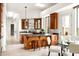 Bright kitchen with a central island, modern appliances, and an adjacent breakfast nook with plentiful seating at 15816 E Eagle Crest Rd, Fountain Hills, AZ 85268