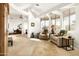 Bright living room with comfortable seating, large windows and stylish decor, creating an inviting space at 15816 E Eagle Crest Rd, Fountain Hills, AZ 85268
