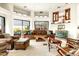 Spacious living room has tiled floors, comfortable seating, and large windows at 15816 E Eagle Crest Rd, Fountain Hills, AZ 85268