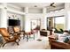Bright living room boasts tiled floors, comfy seating, and great natural light at 15816 E Eagle Crest Rd, Fountain Hills, AZ 85268