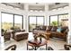 Bright living room features tiled floors, comfortable seating, and a beautiful view at 15816 E Eagle Crest Rd, Fountain Hills, AZ 85268