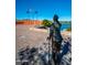 Statue of a veteran overlooking lake, with flags waving proudly at 15816 E Eagle Crest Rd, Fountain Hills, AZ 85268