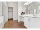 Bright bathroom featuring a walk-in shower, vanity area, and ample space for comfortable living at 15959 W Hearn Rd, Surprise, AZ 85379