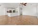 Spacious living room that seamlessly connects to a modern kitchen, perfect for entertaining guests at 15959 W Hearn Rd, Surprise, AZ 85379