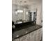 Open dining area near kitchen, showcasing a modern chandelier and stylish finishes, perfect for entertaining guests at 1601 N Saba St # 255, Chandler, AZ 85225