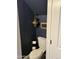 Stylish powder room with unique wallpaper and elegant lighting, adding a touch of luxury for guests at 1601 N Saba St # 255, Chandler, AZ 85225